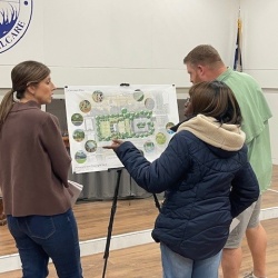Residents look at Grace Triangle Park Concept