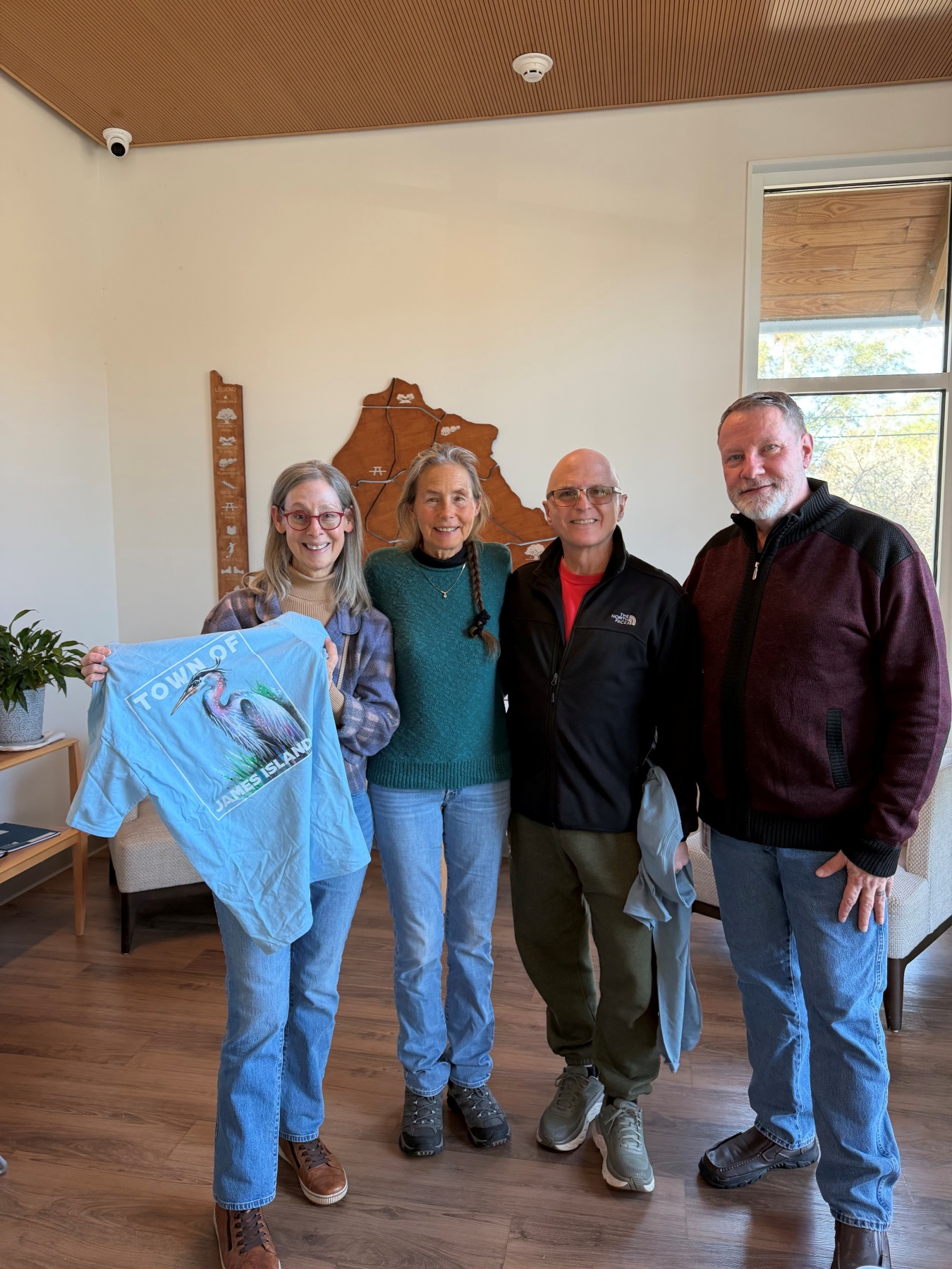 Sandy Hall receives t-shirts from Town